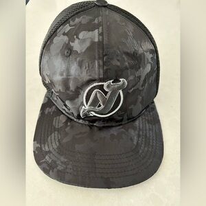 NHL NJ Devils black camo baseball cap.